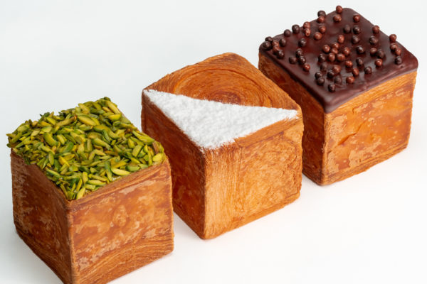 Cube croissants from Le Deli Robuchon, topped with pistachio and chocolate.