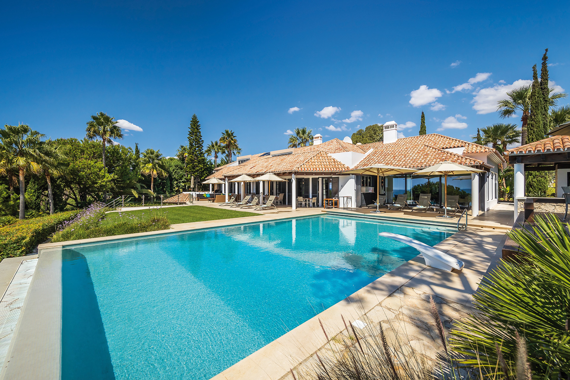 A Portugese villa with bright blue pool
