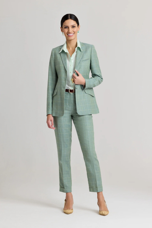 Woman in green suit