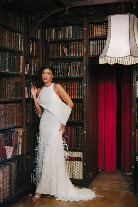 Woman stood in home library