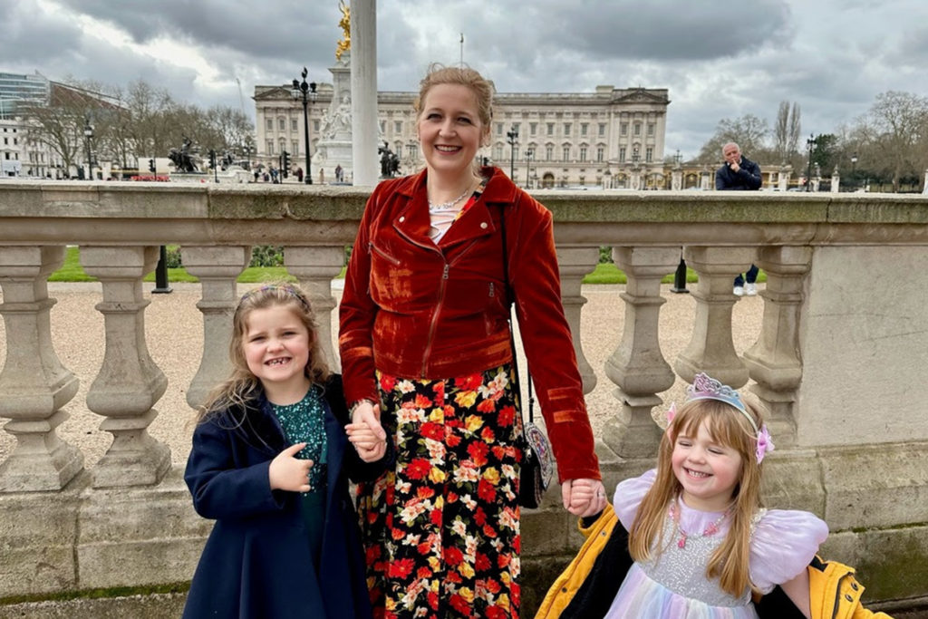 Mrs Rochford, Lucy and Faye outside Buckingham Palace