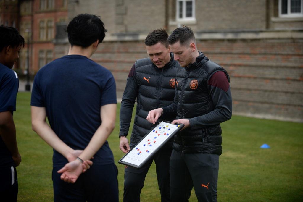 Manchester City Football Club coaches training Rossall students