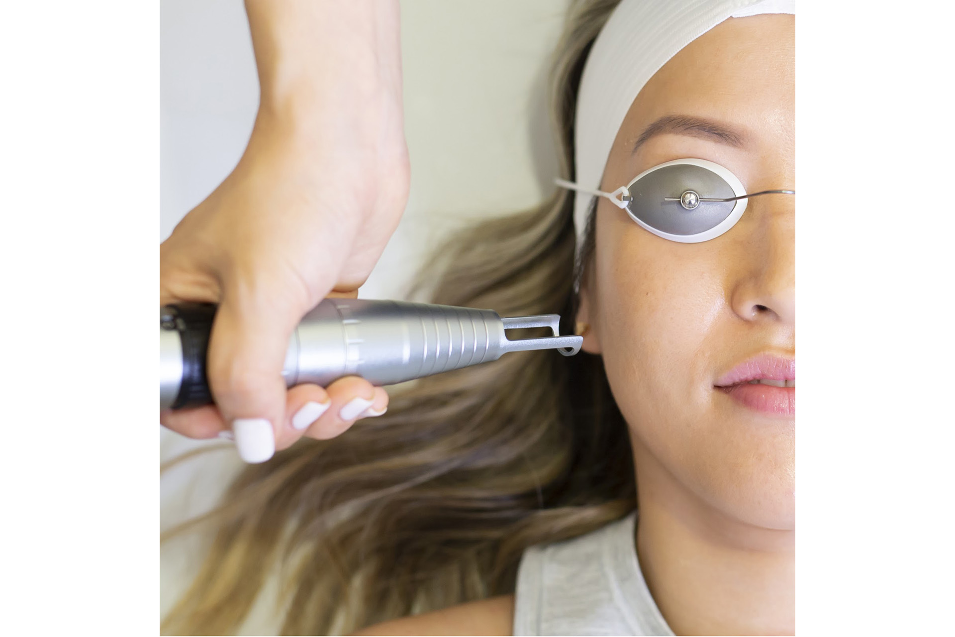 A woman getting a laser facial