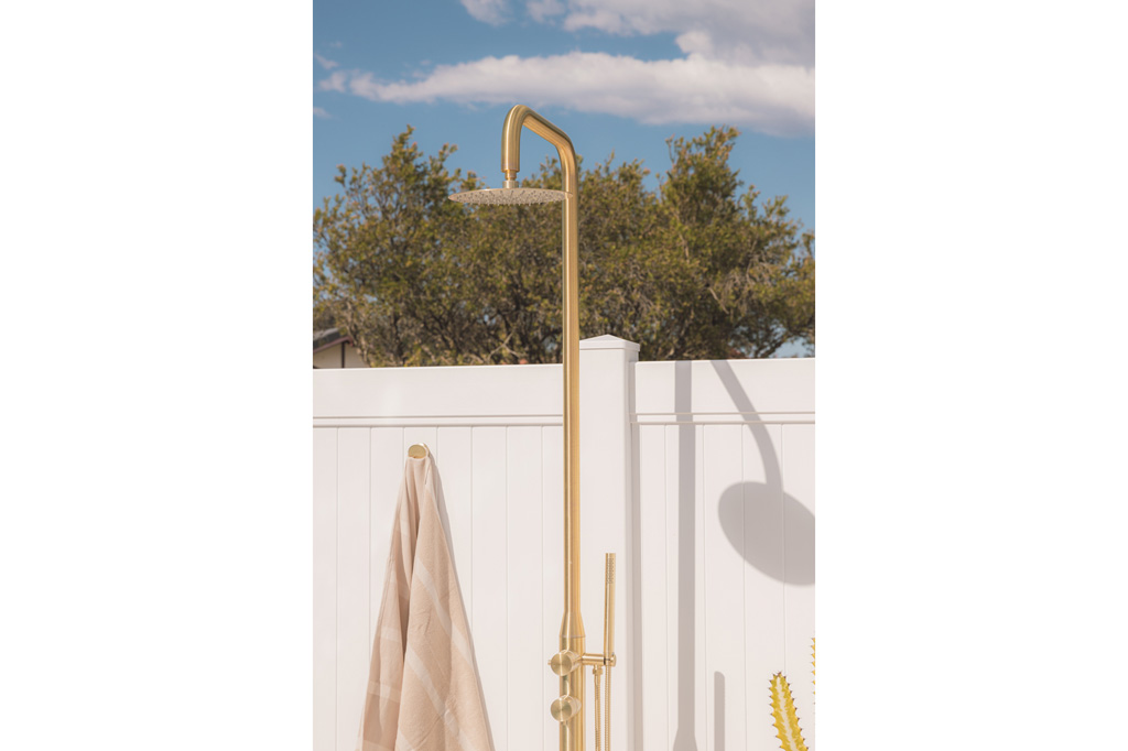 An outdoor shower by ABI Interiors
