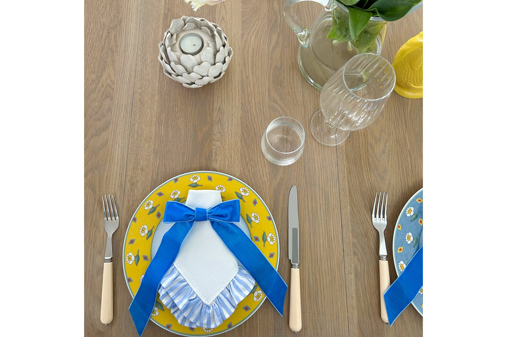 An example of spring tablescaping with a big blue velvet bow