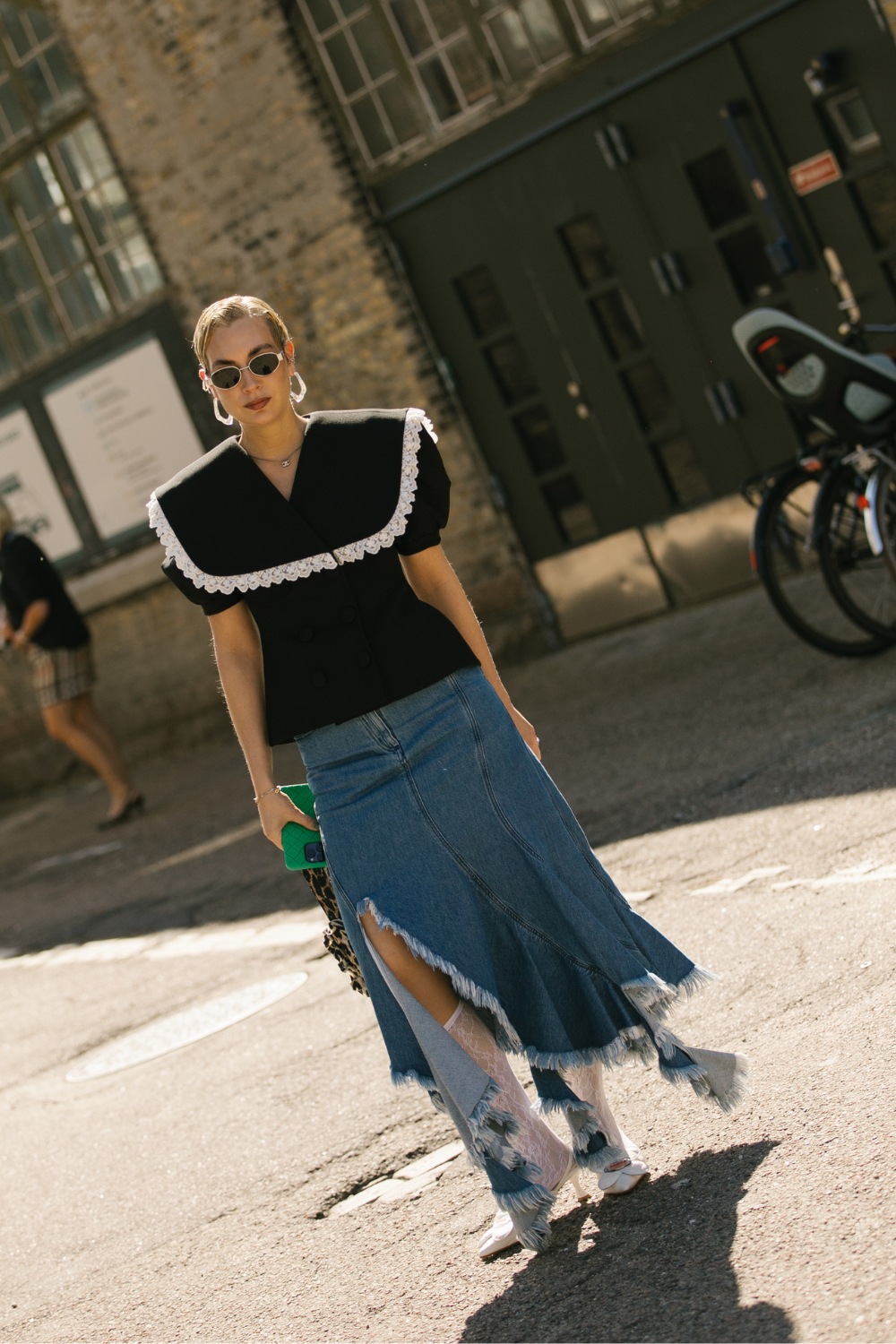 Woman wearing black shirt and long skirt