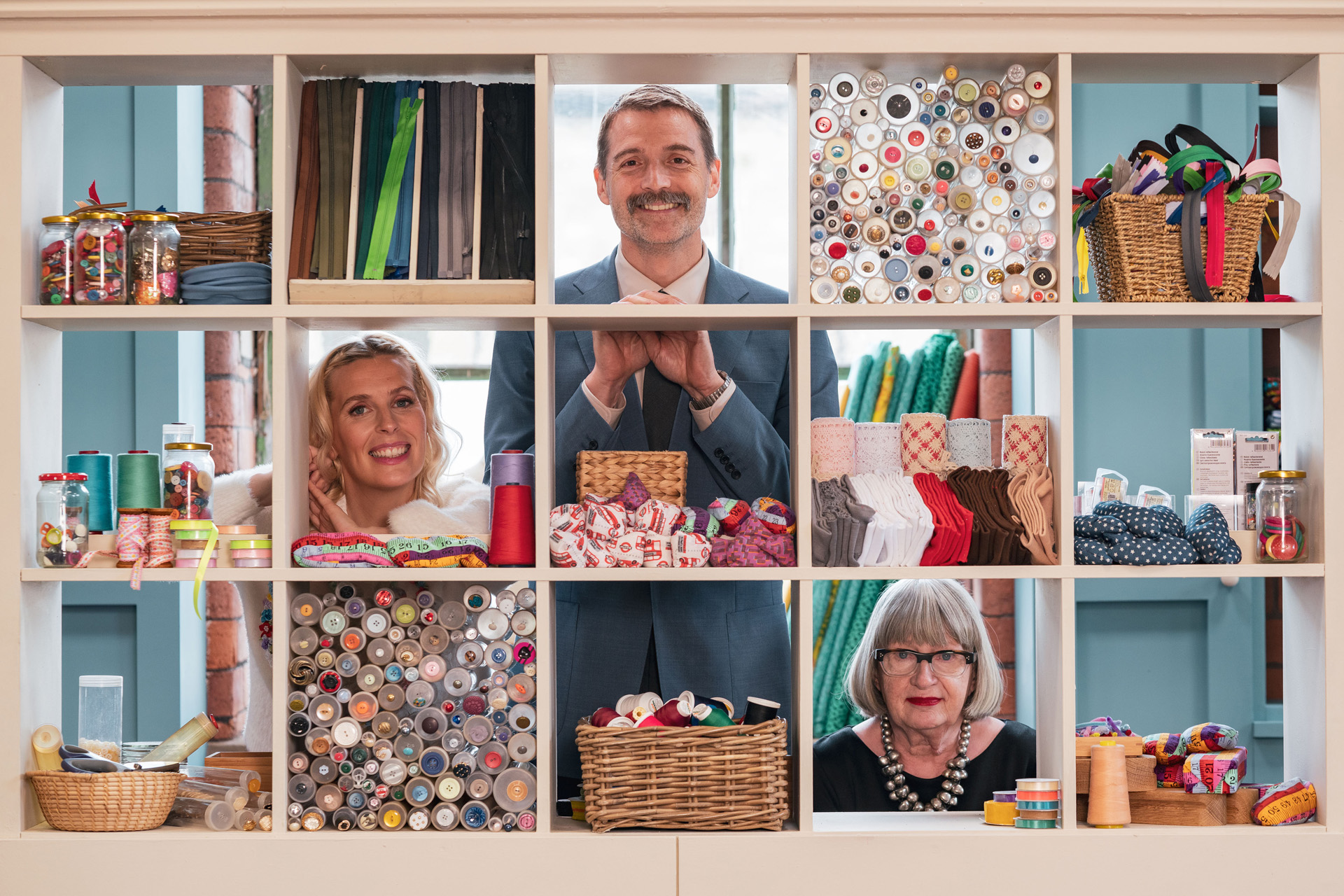 Presenter Sara Pascoe with Judges Patrick Grant and Esme Young in the Sewing Room. 