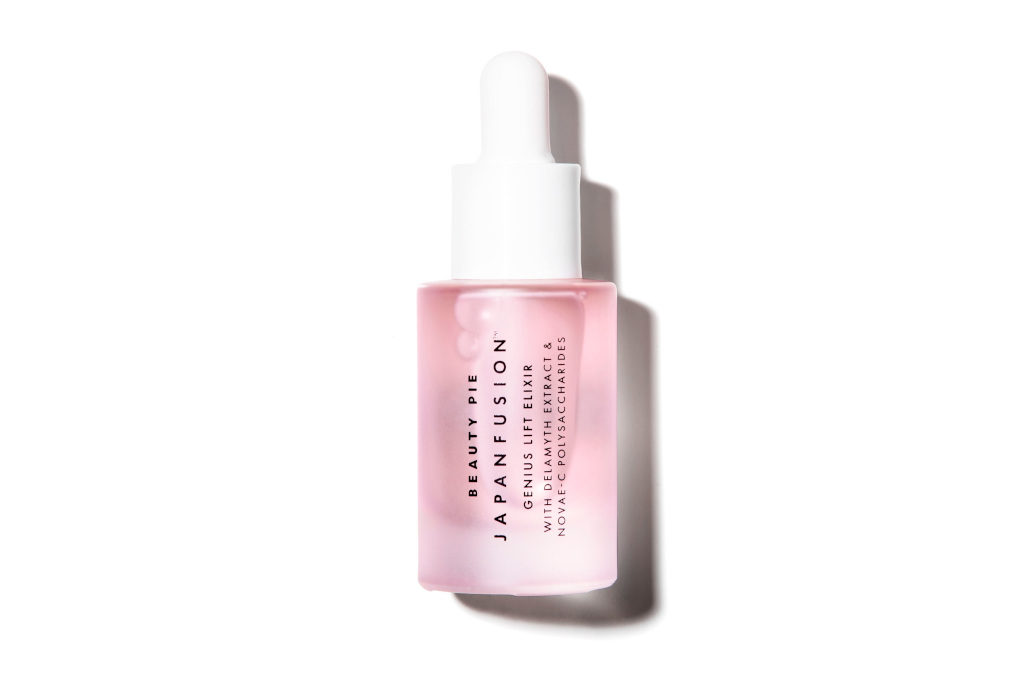 Pink and white serum bottle | skincare for laugh lines