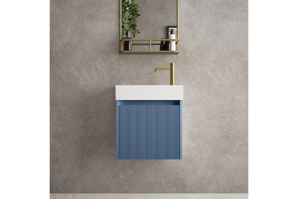 A blue sink cabinet
