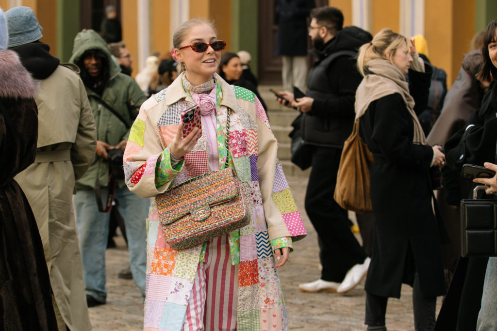 Woman in quilted patchwork jacket
