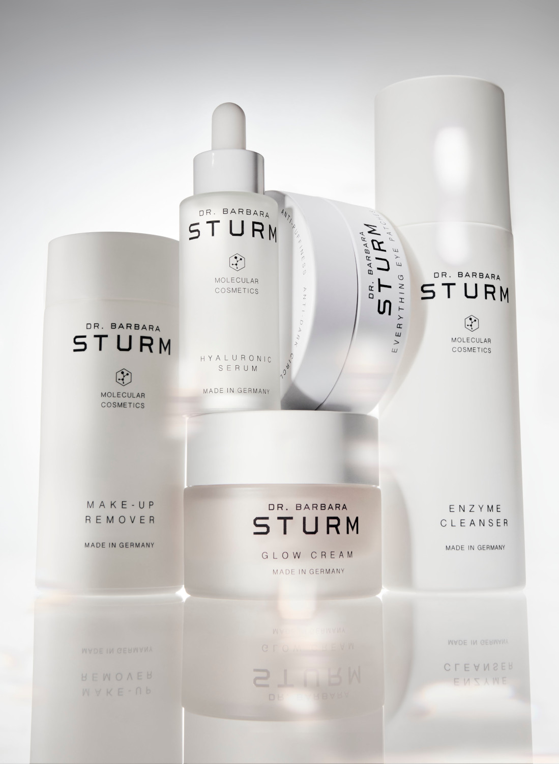 Skincare products stacked together in pile