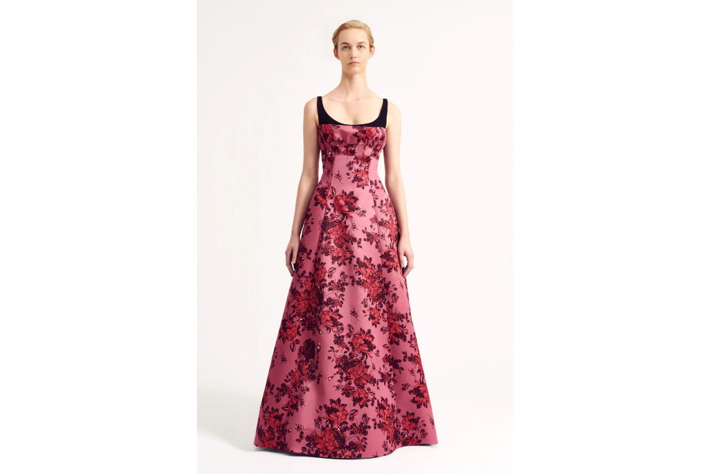 Woman in pink floral ball gown