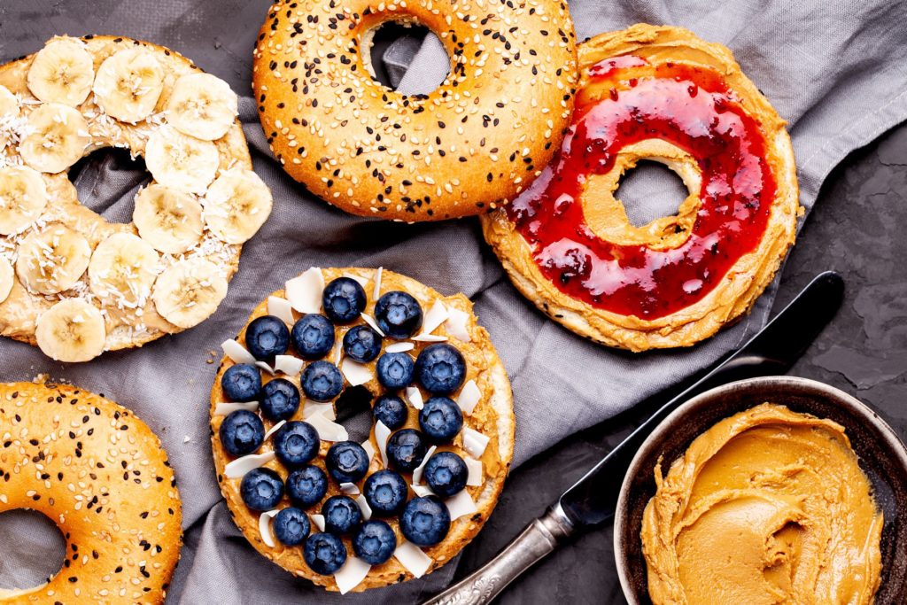 Bagels with peanut butter and fruit