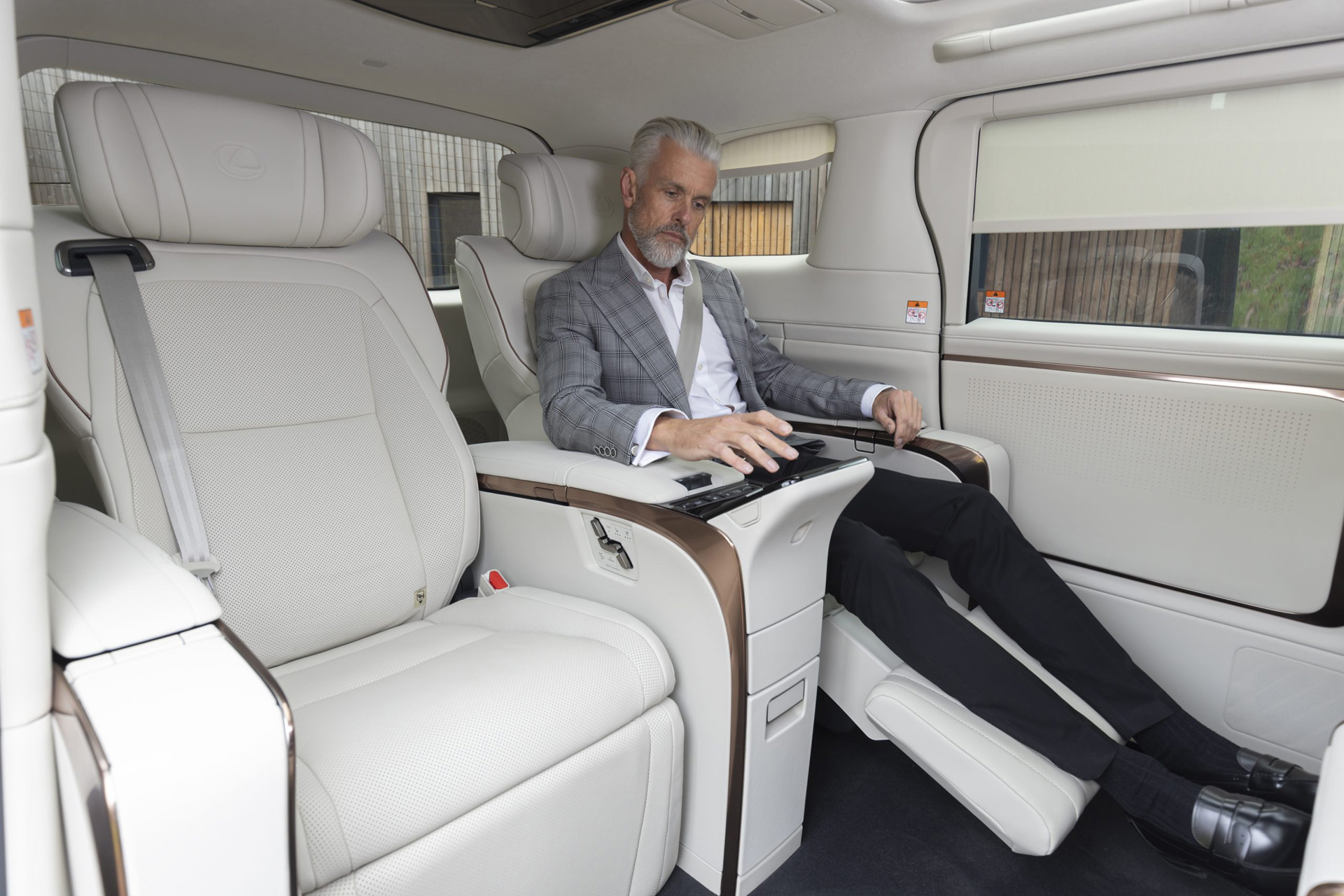 Inside the car with white faux leather seats