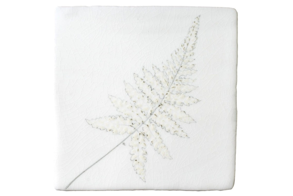 Leaf painting on white tile