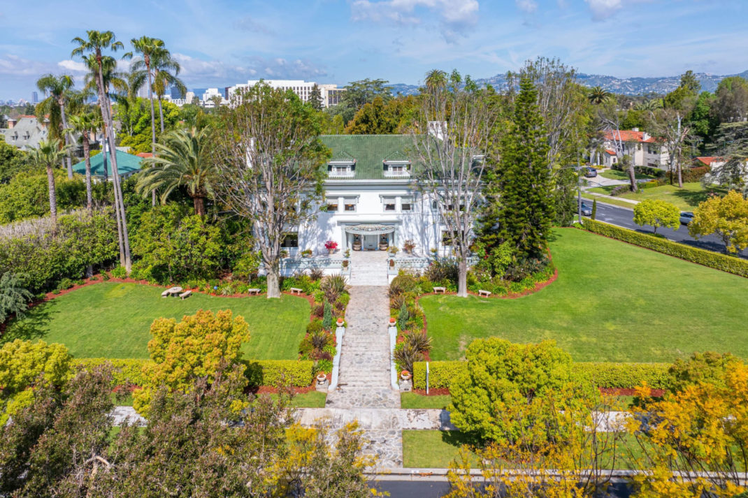Mansion surrounded by green gardens | Muhammad Ali's LA Mansion