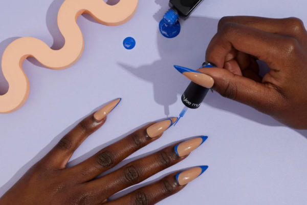 Hand with blue nails