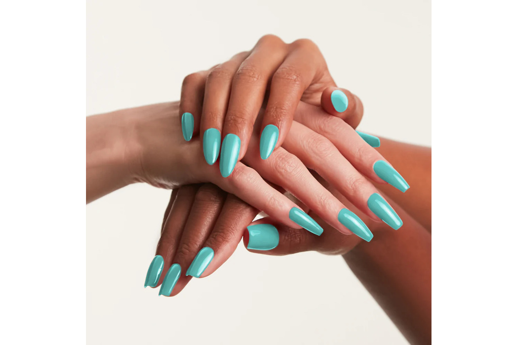 Hand with blue-green manicure