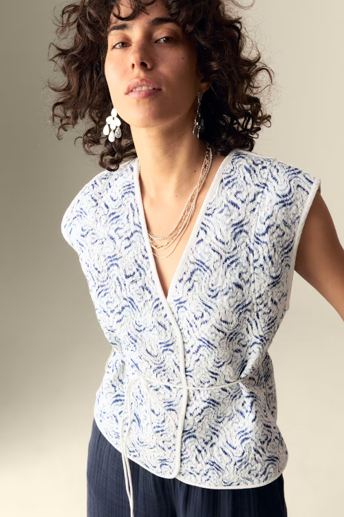 Woman wearing printed vest