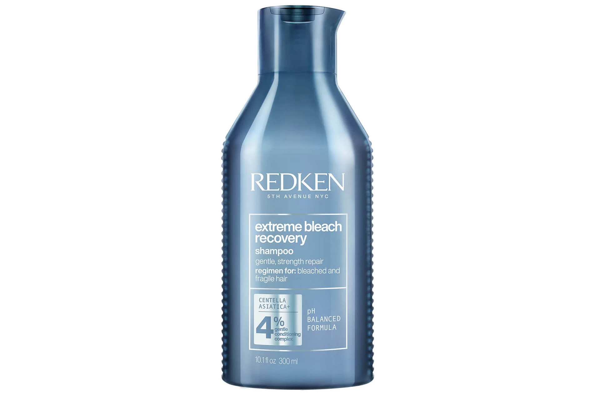 A bottle of Redken blonde hair treatment