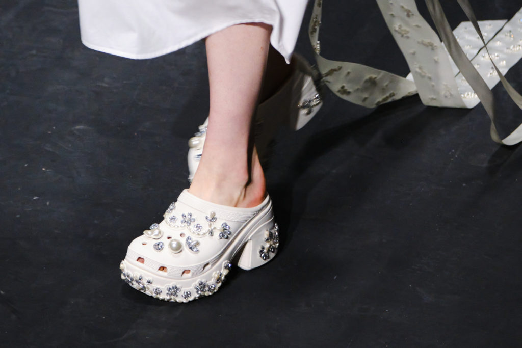 Simone Rocha model in white Crocs