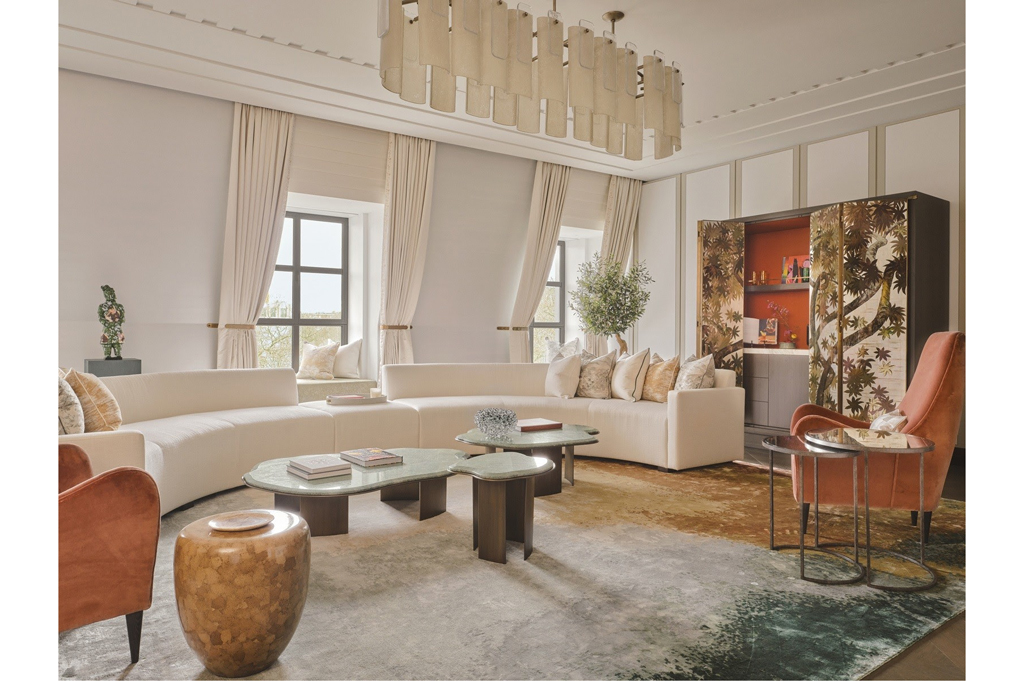 A living room decorated in brown and neutral interiors