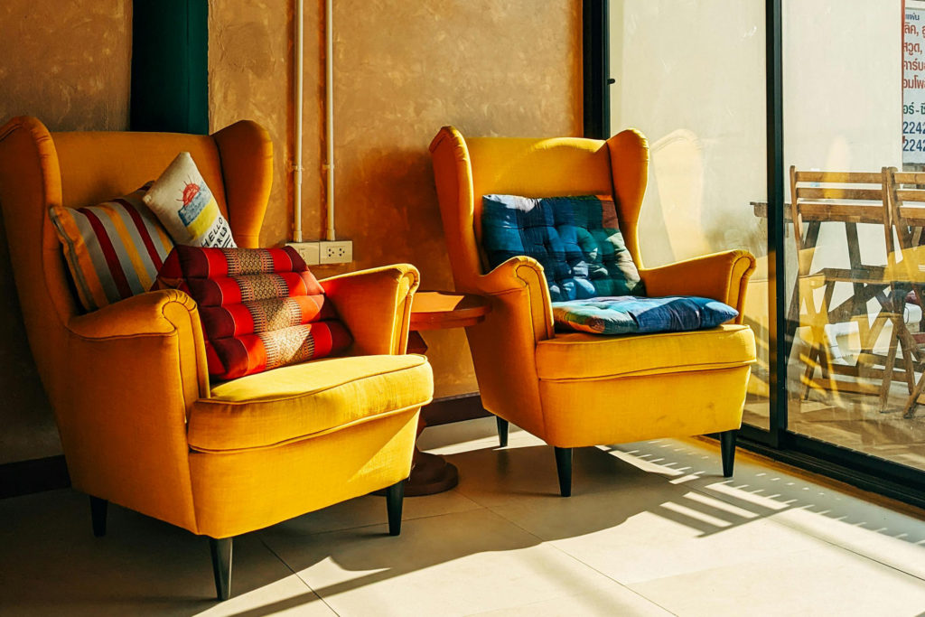 Two yellow armchairs