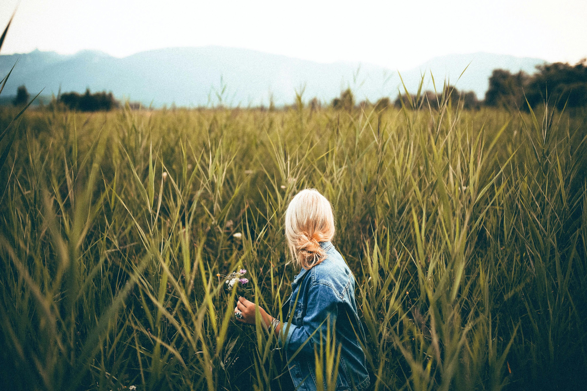A Blonde woman in a field