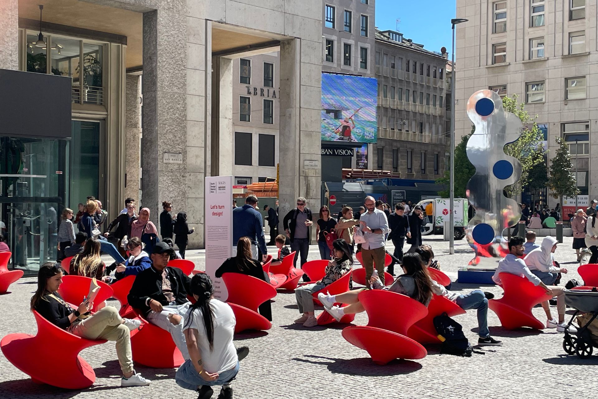 Red rotaing chairs in Milan
