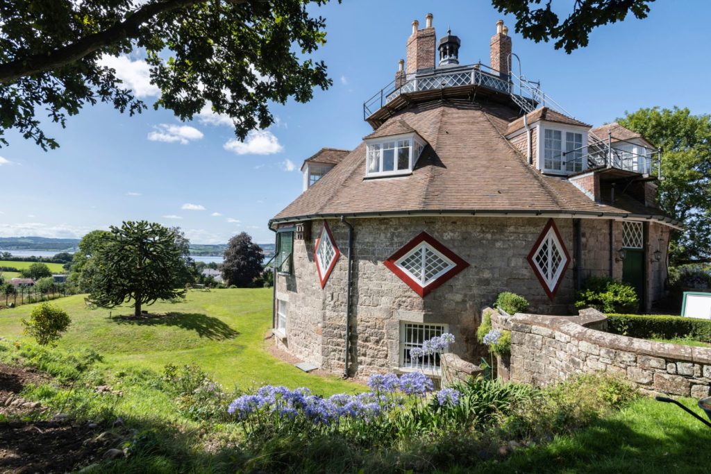Exterior of A La Ronde, a 16-sided National Trust cottage in Devon.