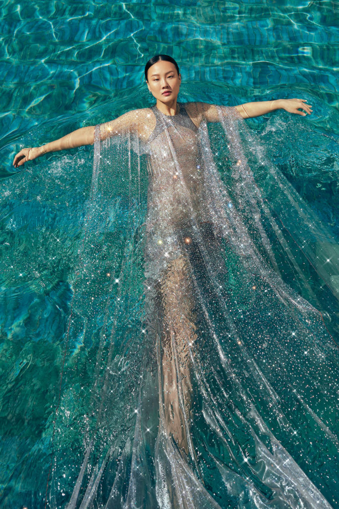 C&TH May/June 2024 summer style shoot at Beaverbrook model in sparkly dress in swimming pool