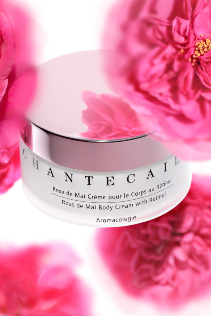 Tub of skin cream with pink flowers