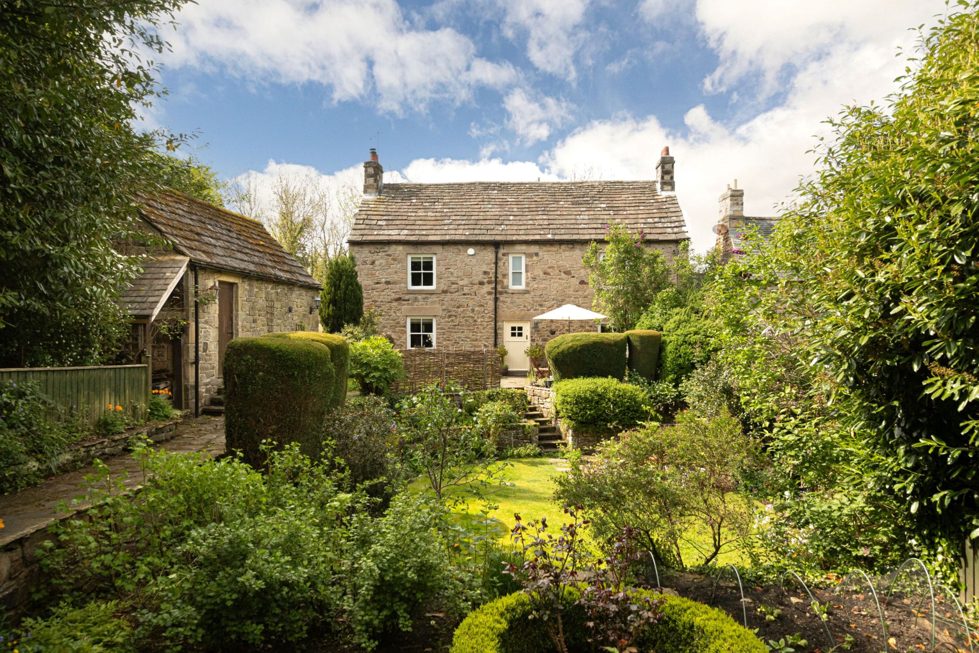 Stone cottage with landscaped rear garden