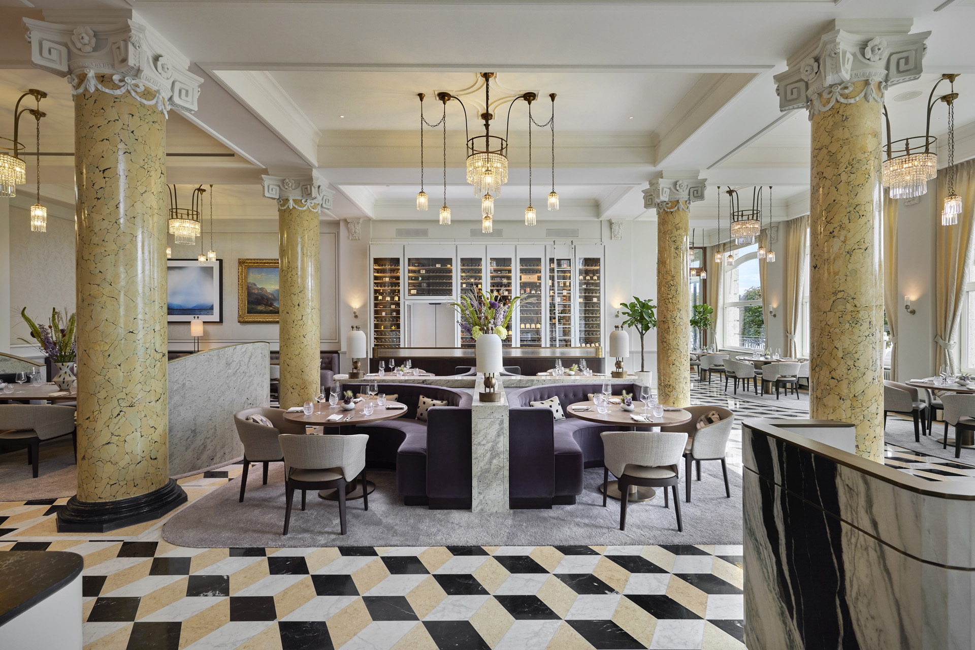 A spacious Belle Epoque dining room at the Mandarin Oriental Palace Luzern