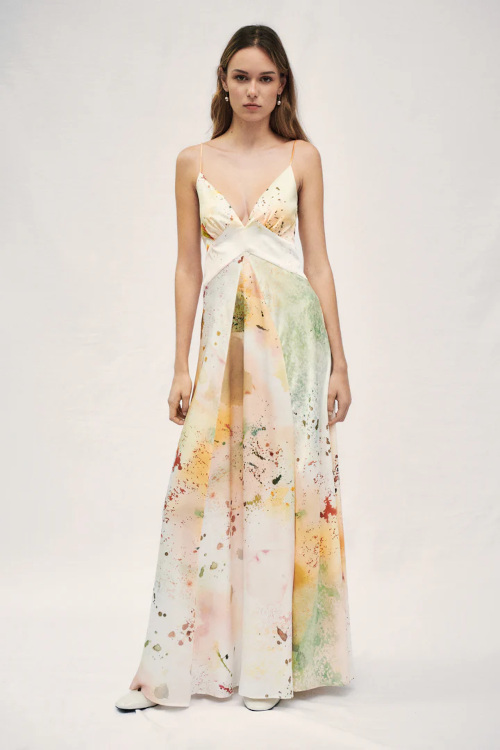 Woman in multi-coloured dress