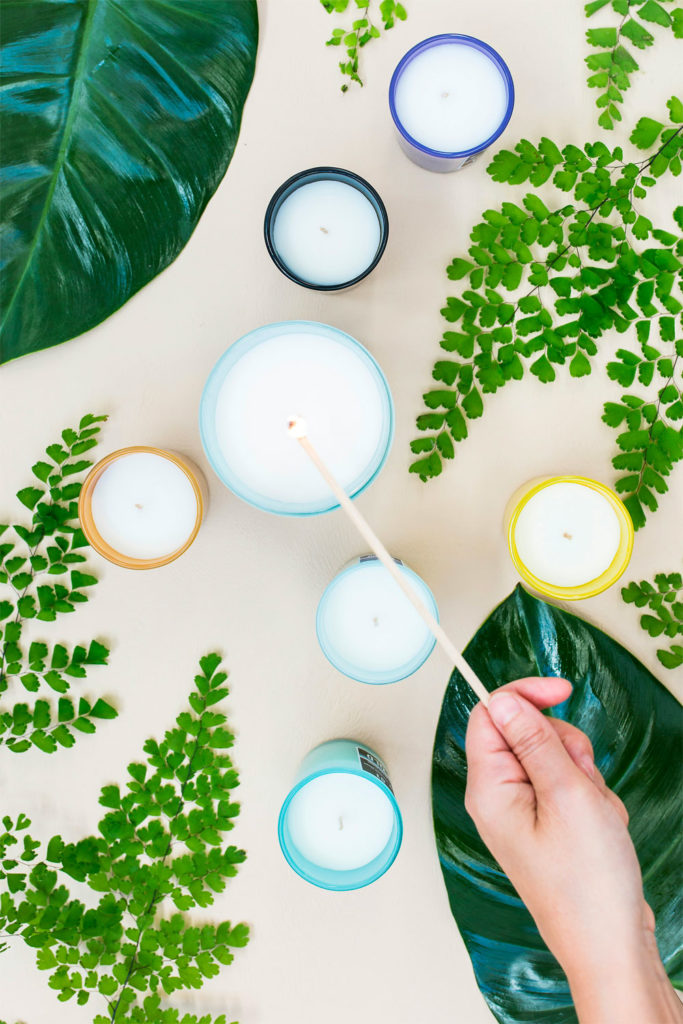 Scented candles being lit