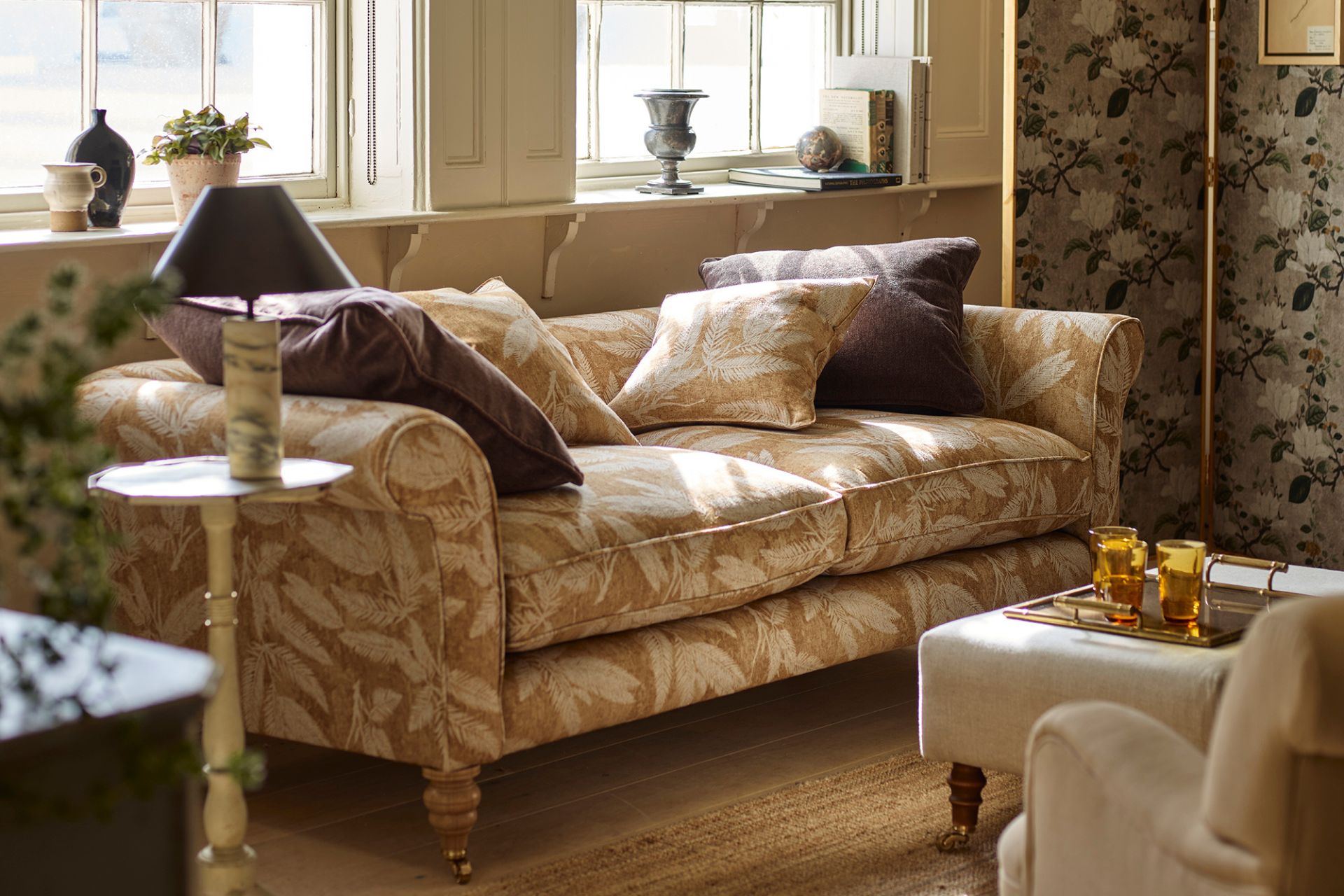 Sofa with a yellow and white botanical fabric