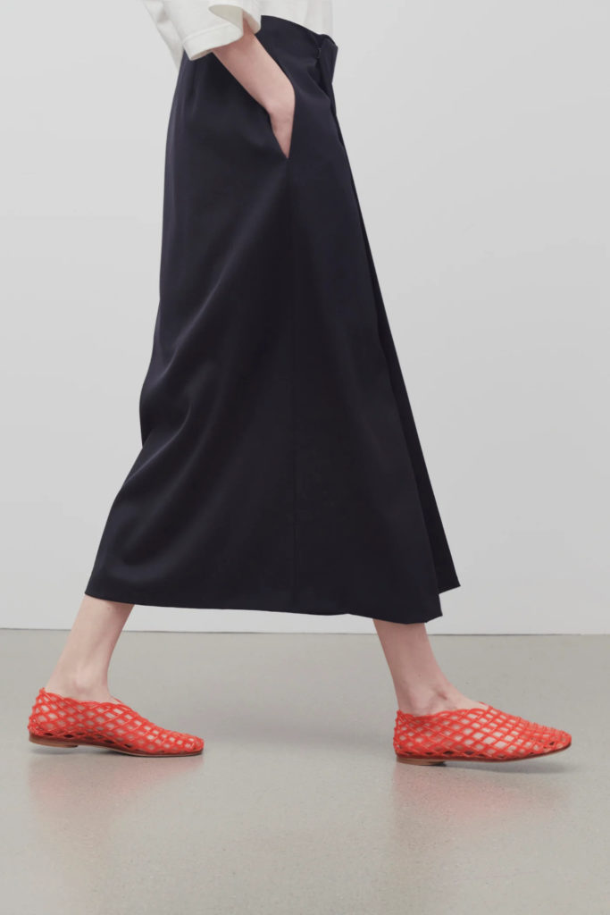Woman walking in jelly sandals