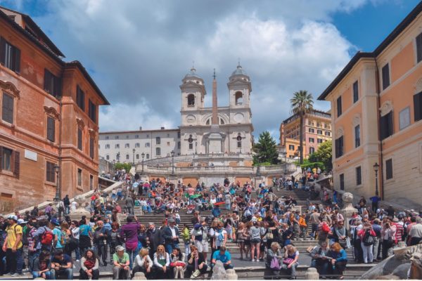 Tourists crowding the streets of Rome