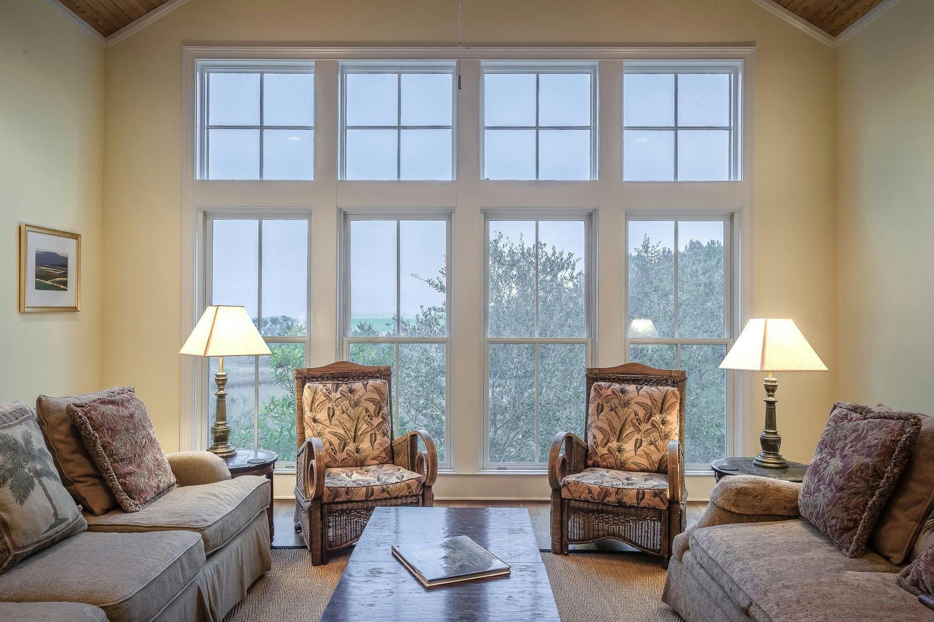 A living room with large windows