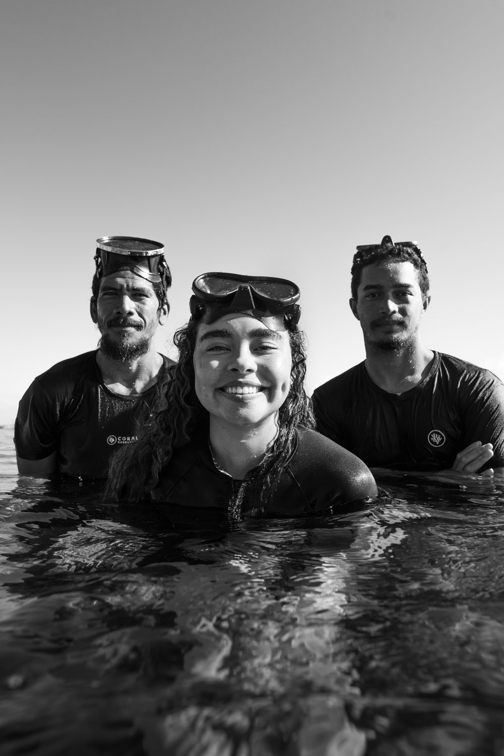 Bailey Bass diving in Tahiti