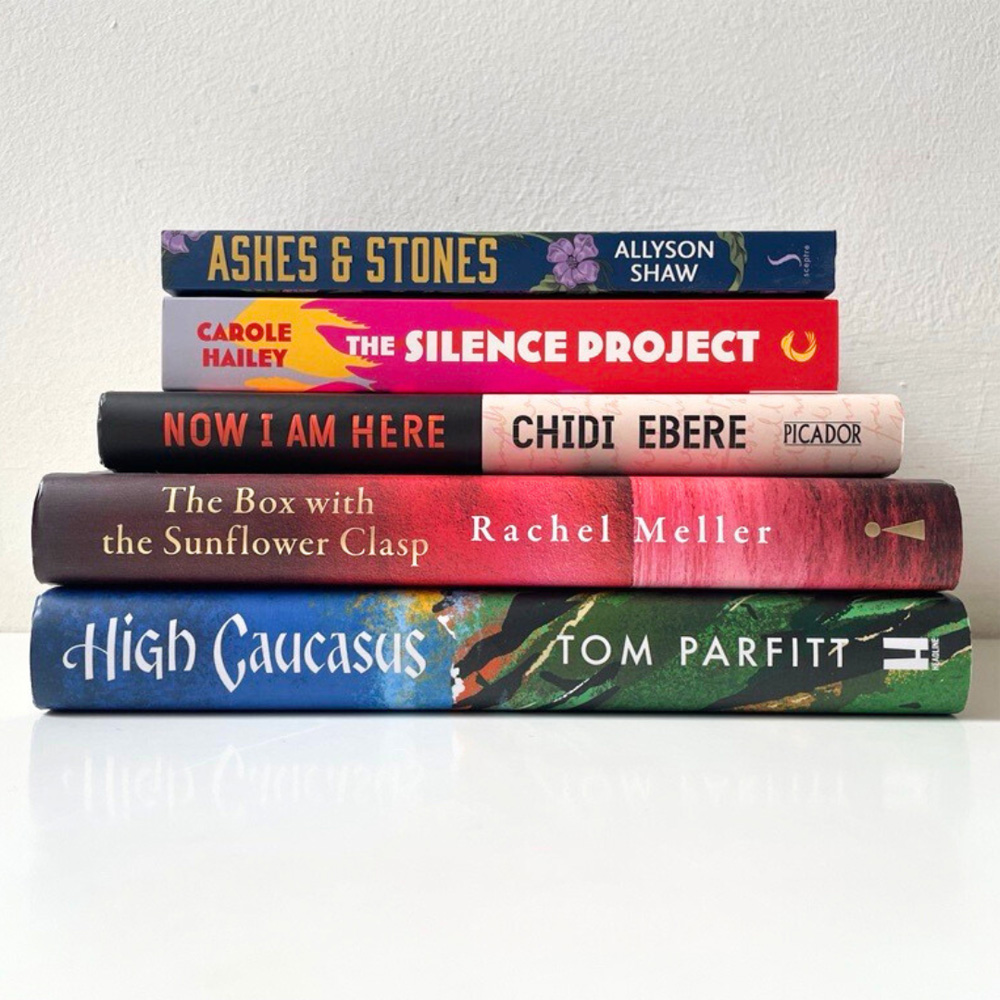 A stack of books shortlisted for the 2024 Christopher Bland Prize