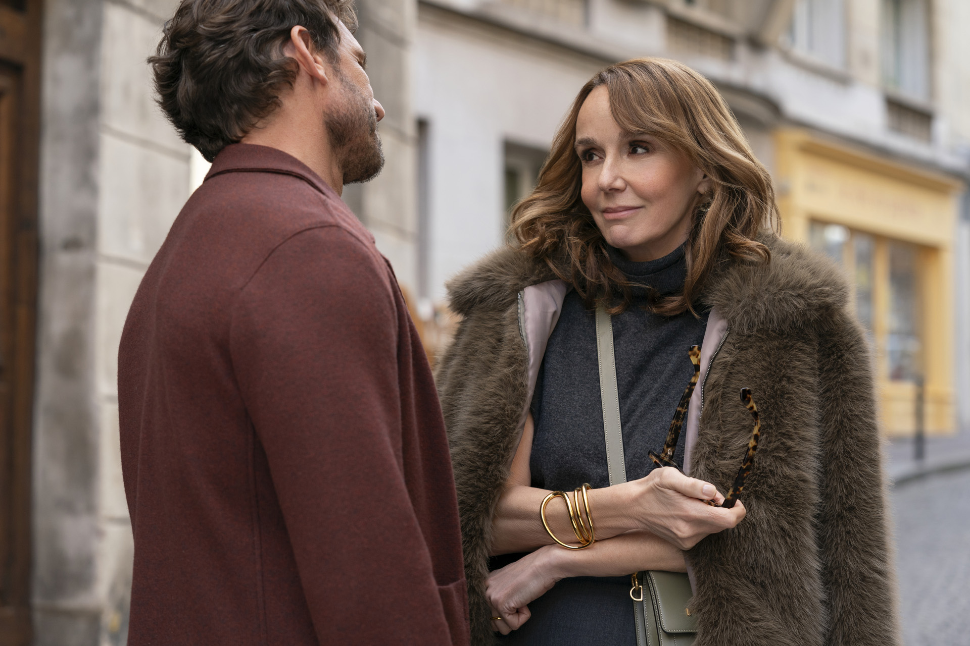 (L to R) Arnaud Binard as Laurent, Philippine Leroy-Beaulieu as Sylvie Grateau in Emily in Paris.