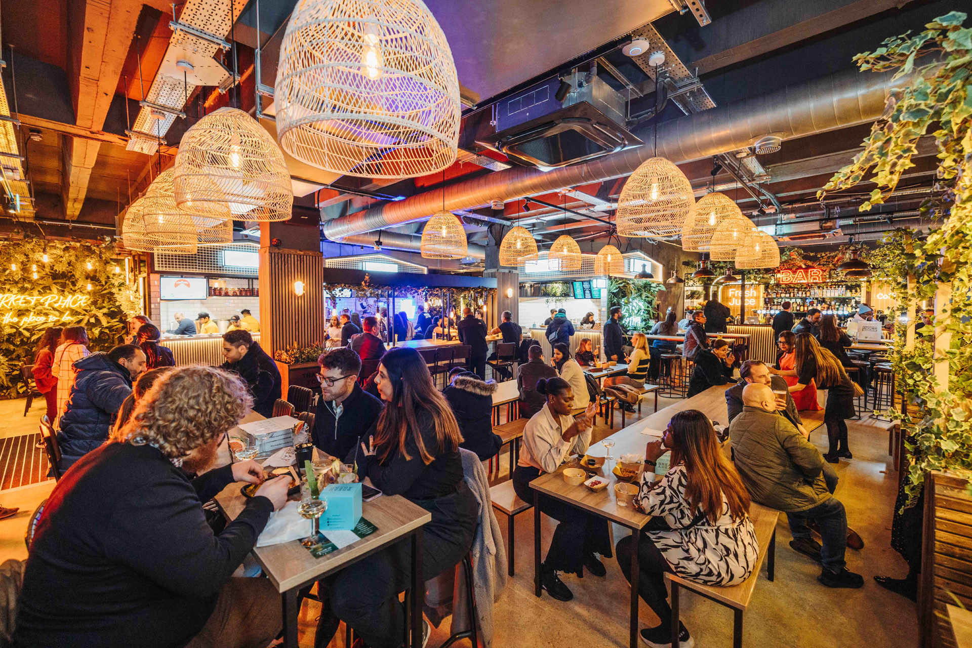 People eating at Market Place in Peckham