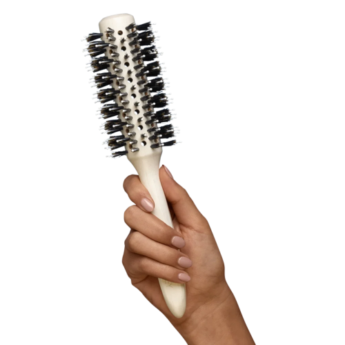 Hand holding brush