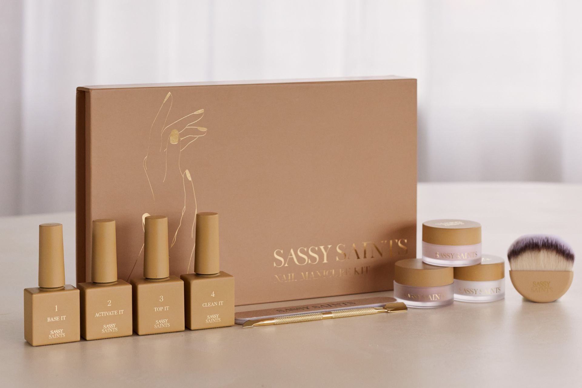 Sassy Saints at-home manicure kit on a white bakcground