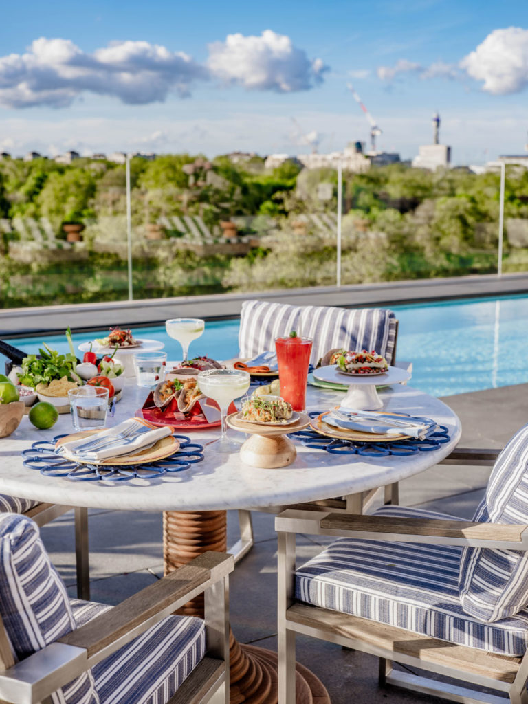 Tacos and cocktails beside a pool