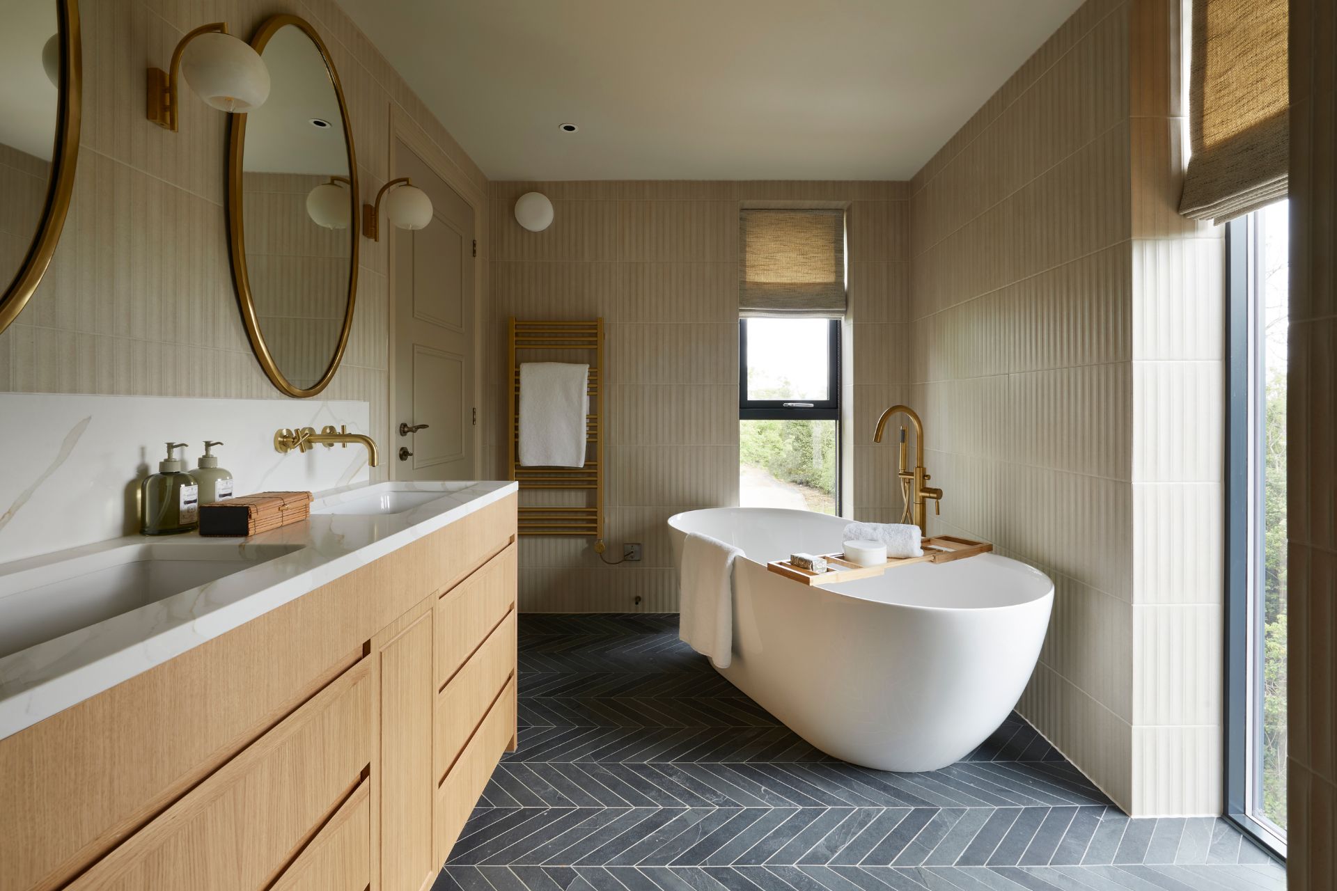 Bathroom with double sink and freestanding bath