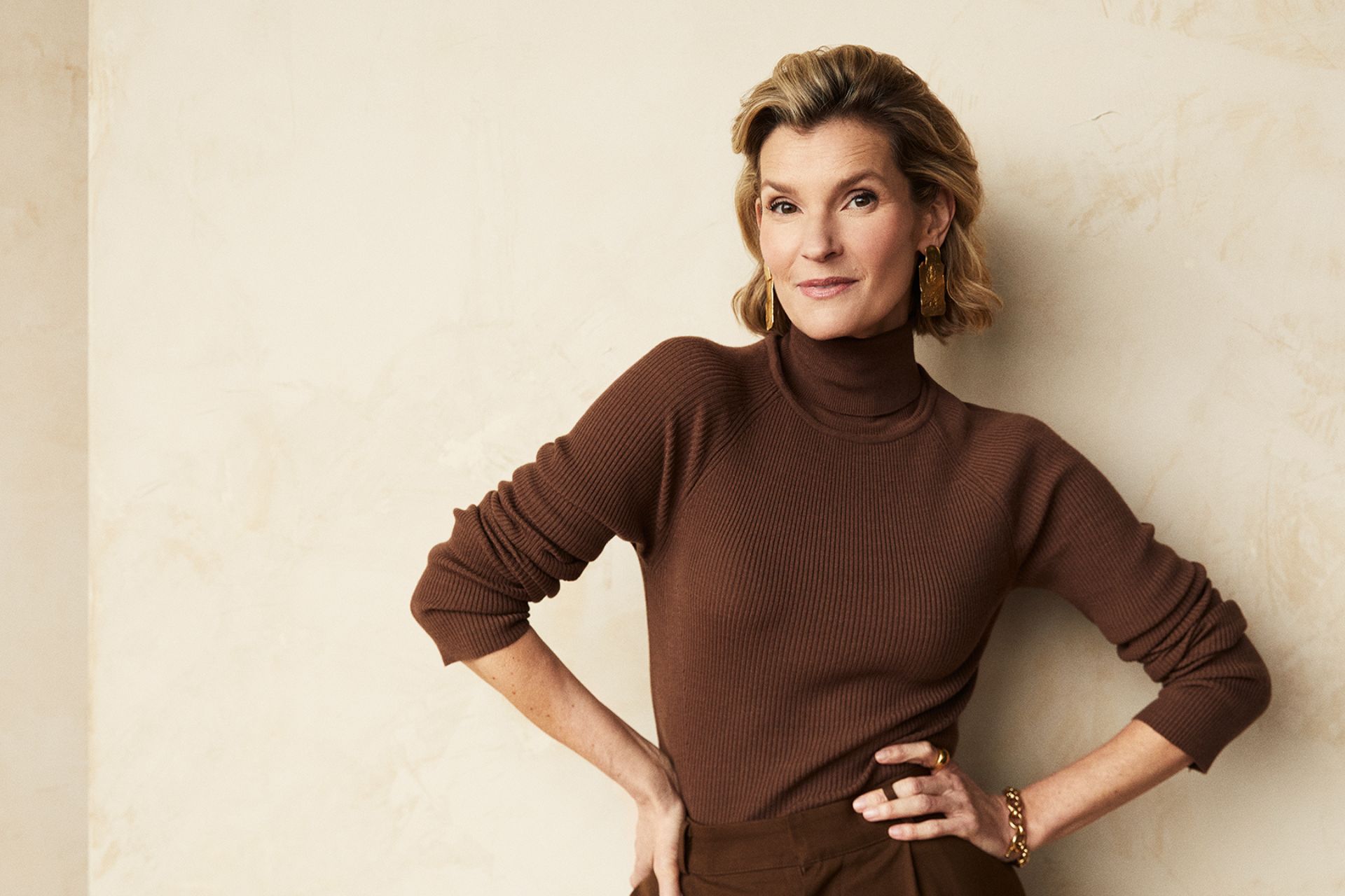 Joanna Bobin wearing a brown turtleneck sweater