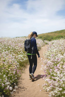 Woman walking in a field